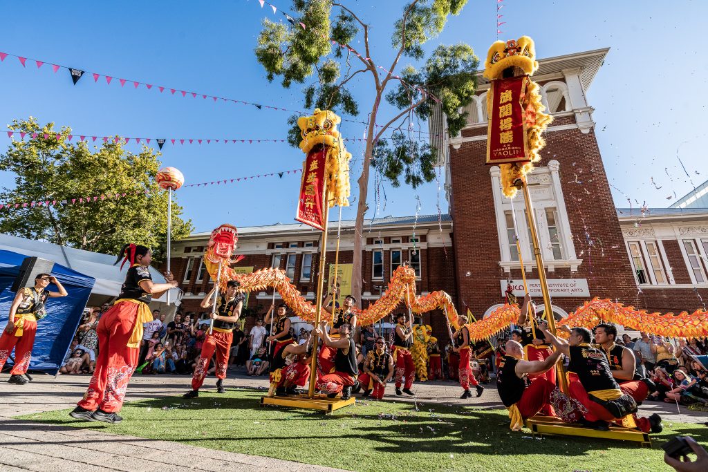 A traditional Chinese New Year dragon dance taking place out the front of PICA